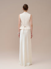 High-waisted silk skirt with fluid drape and floor-length silhouette for timeless elegance